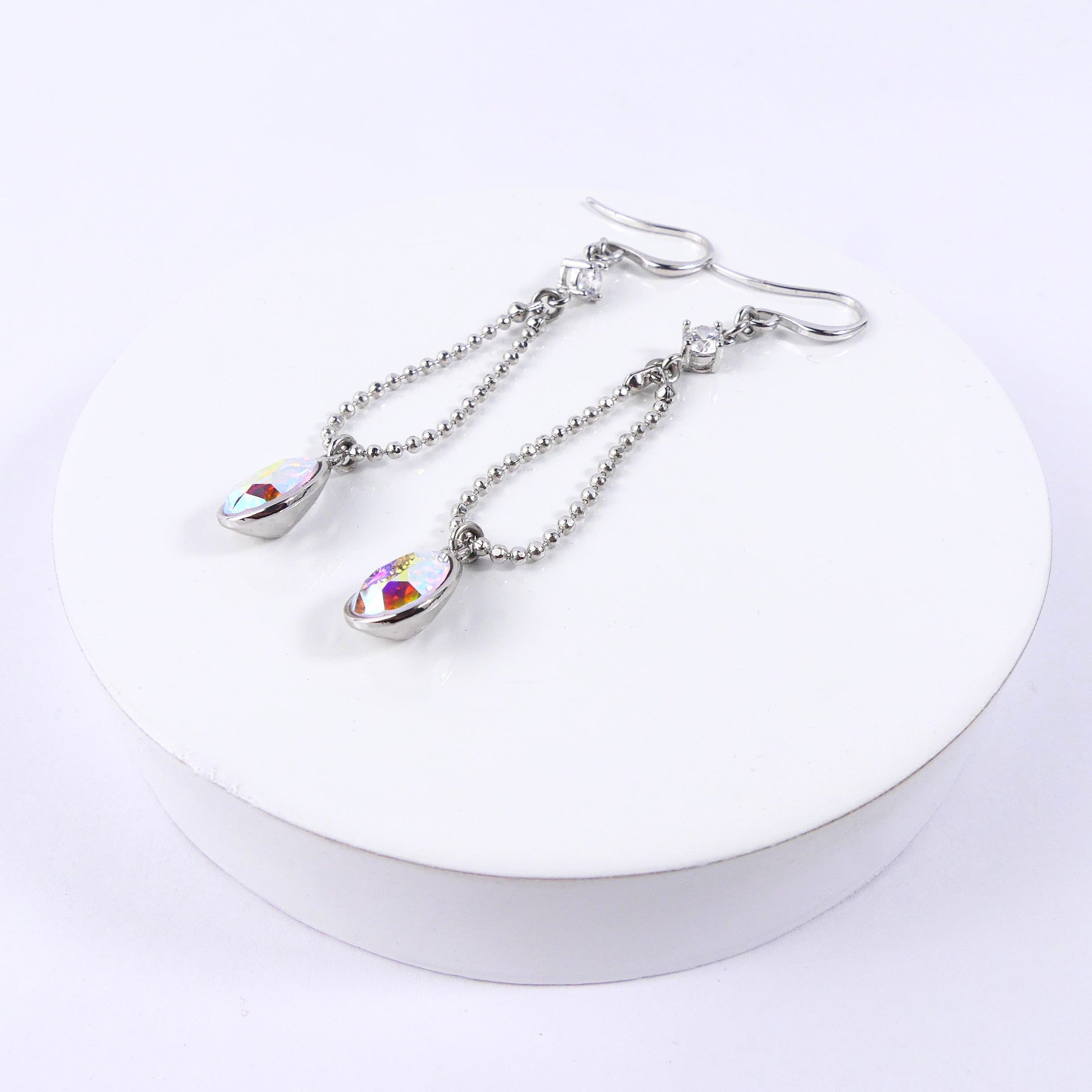 boucle d'oreille goutte reflet