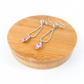 boucle d'oreille pendantes goutte rose