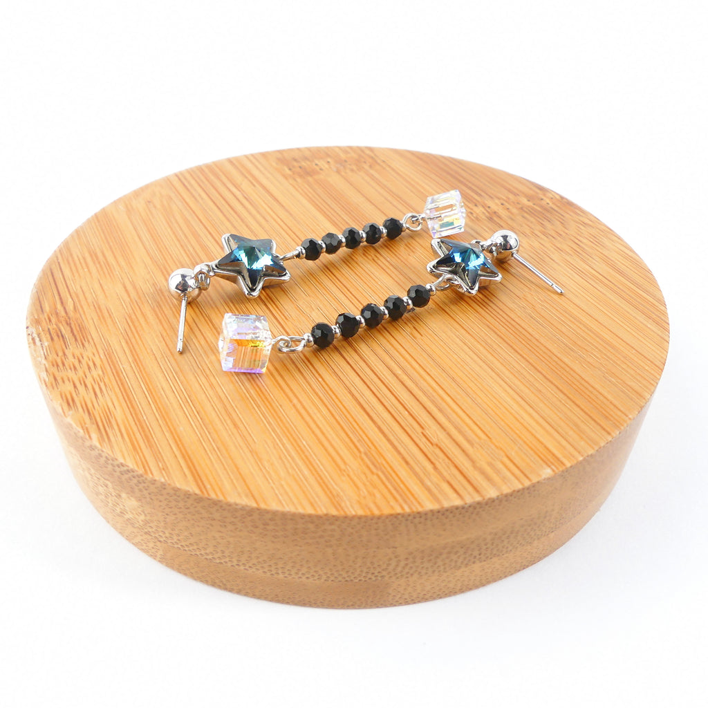 boucle d'oreille pendantes étoile bleu reflet