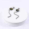 boucle d'oreille pendantes ronde verte reflé
