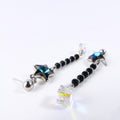 boucle d'oreille pendantes étoile bleu reflet