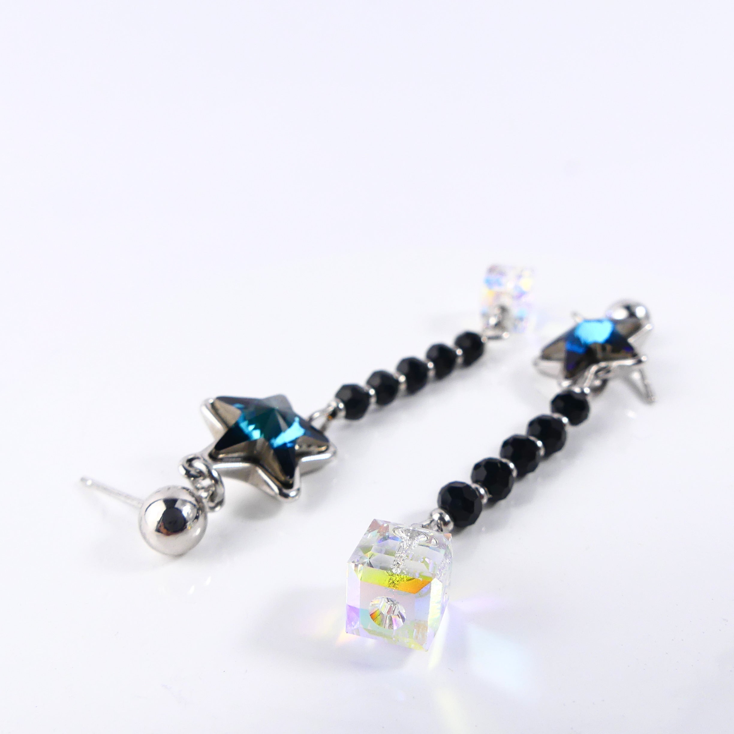 boucle d'oreille pendantes étoile bleu reflet